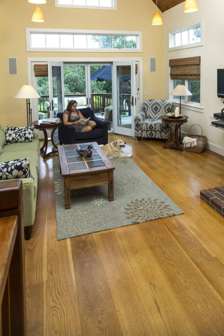 White oak wide plank flooring with girl reading