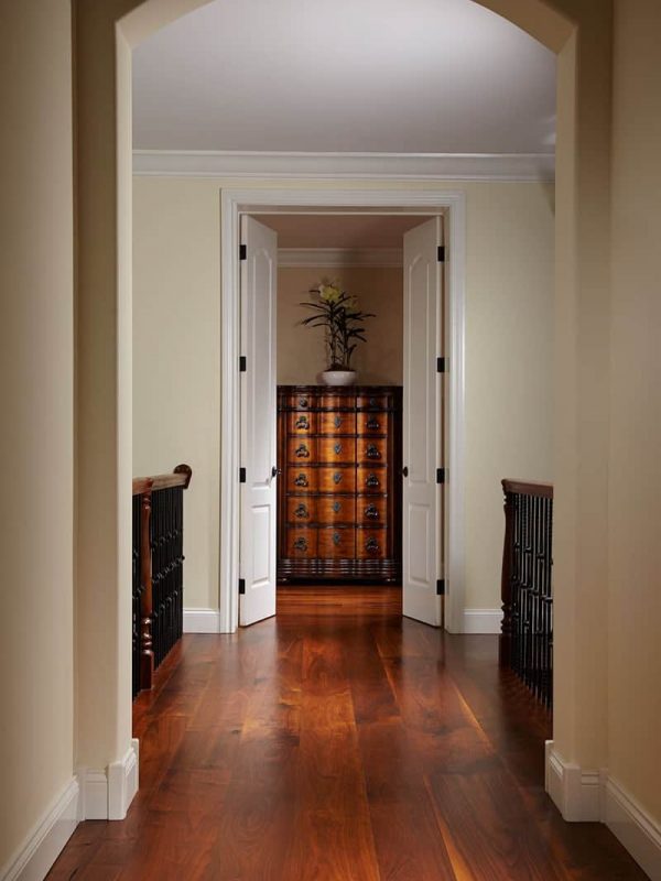 wanut floorign in arched hallway