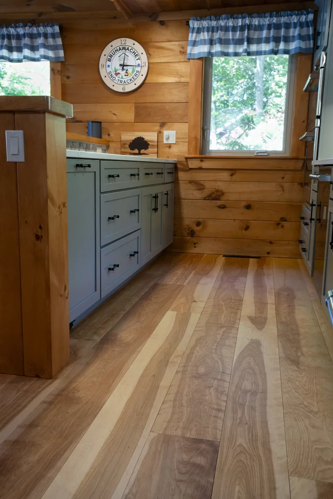 wide plank flooring in rustic kitchen