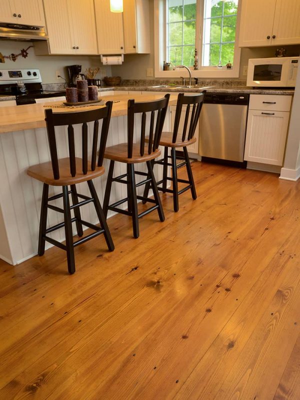 heart pine wide plank flooring used in kitchen