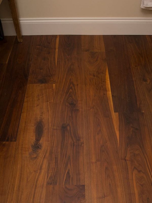 walnut wide plank flooring close up