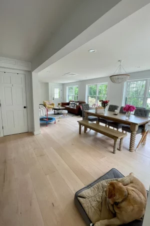 maple flooring in open concept dining room
