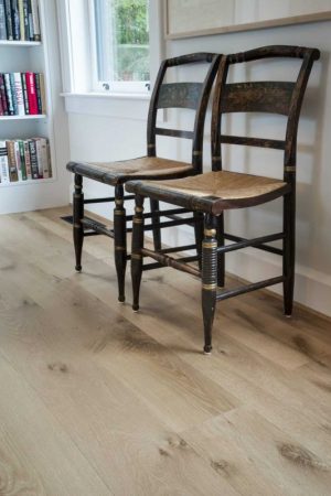two chairs in a white oak hallway